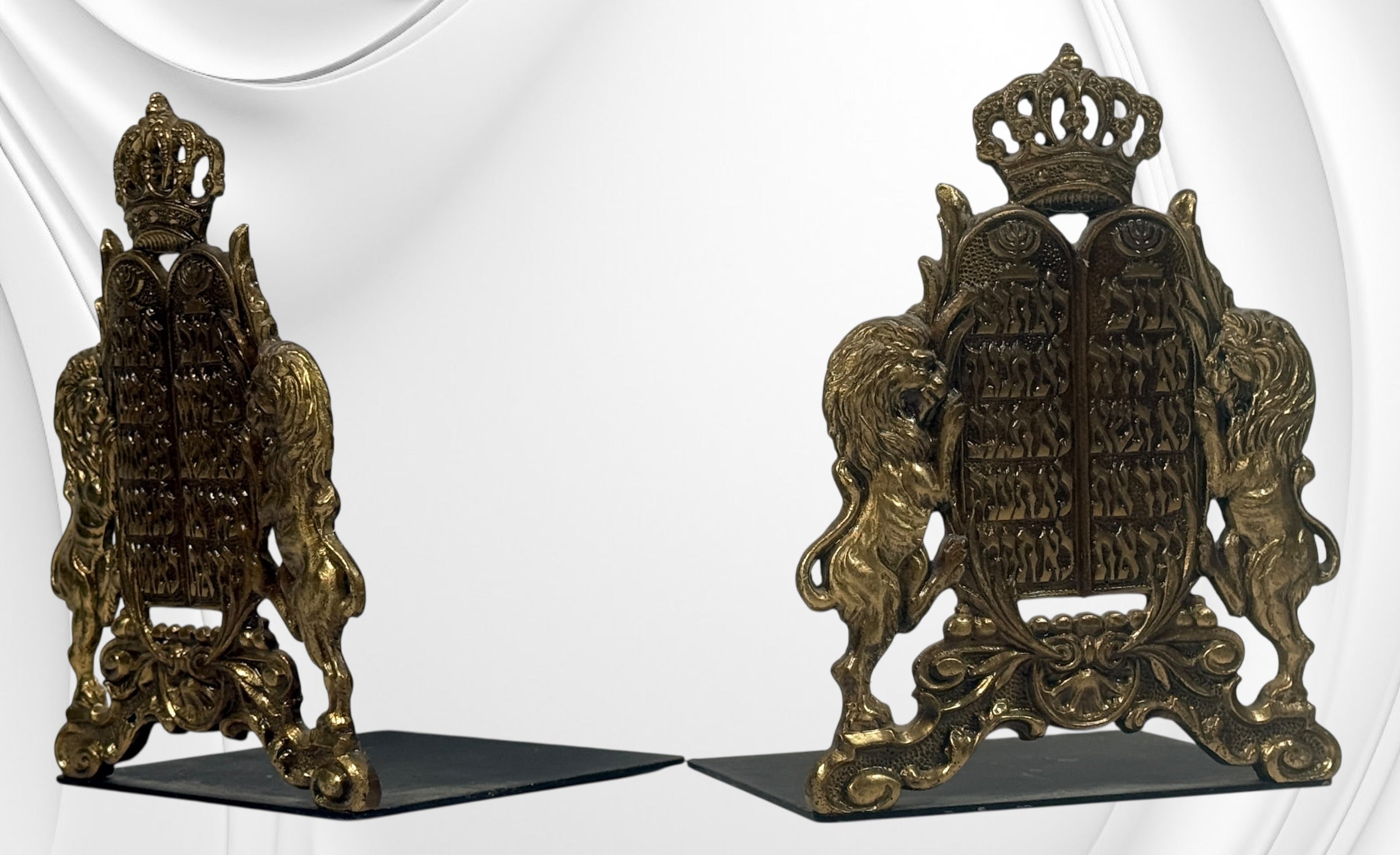 Vintage brass Judaica bookends from Israel with Ten Commandments tablets and lions. Solid decorative pair with classic religious symbolism and display appeal.