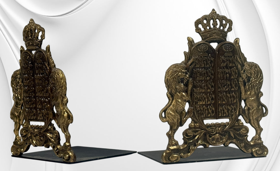 Vintage brass Judaica bookends from Israel with Ten Commandments tablets and lions. Solid decorative pair with classic religious symbolism and display appeal.