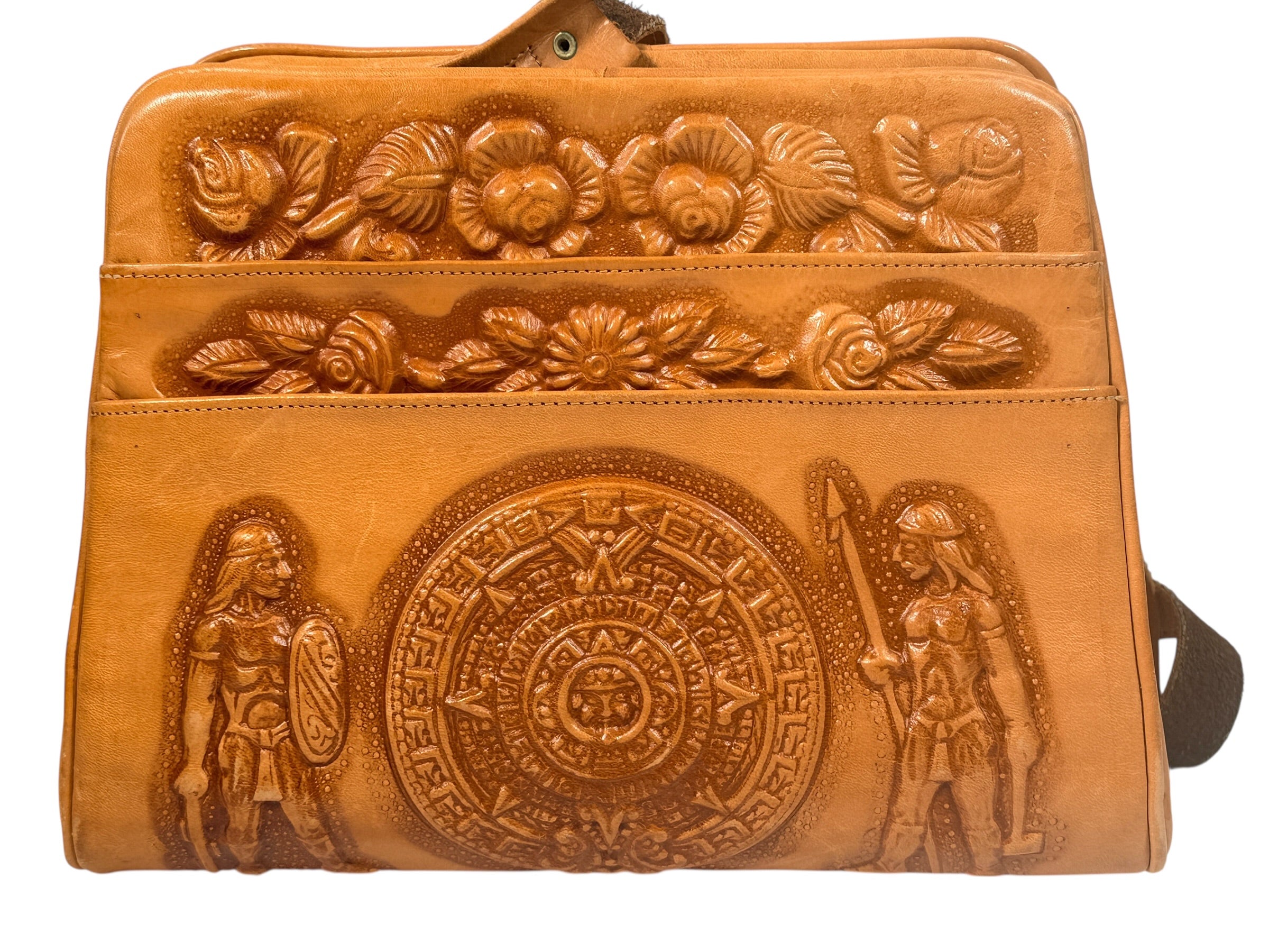 Vintage tooled leather handbag with Aztec motif. Mexican artisan carved shoulder purse, structured boho accessory with strong vintage character and collector appeal.