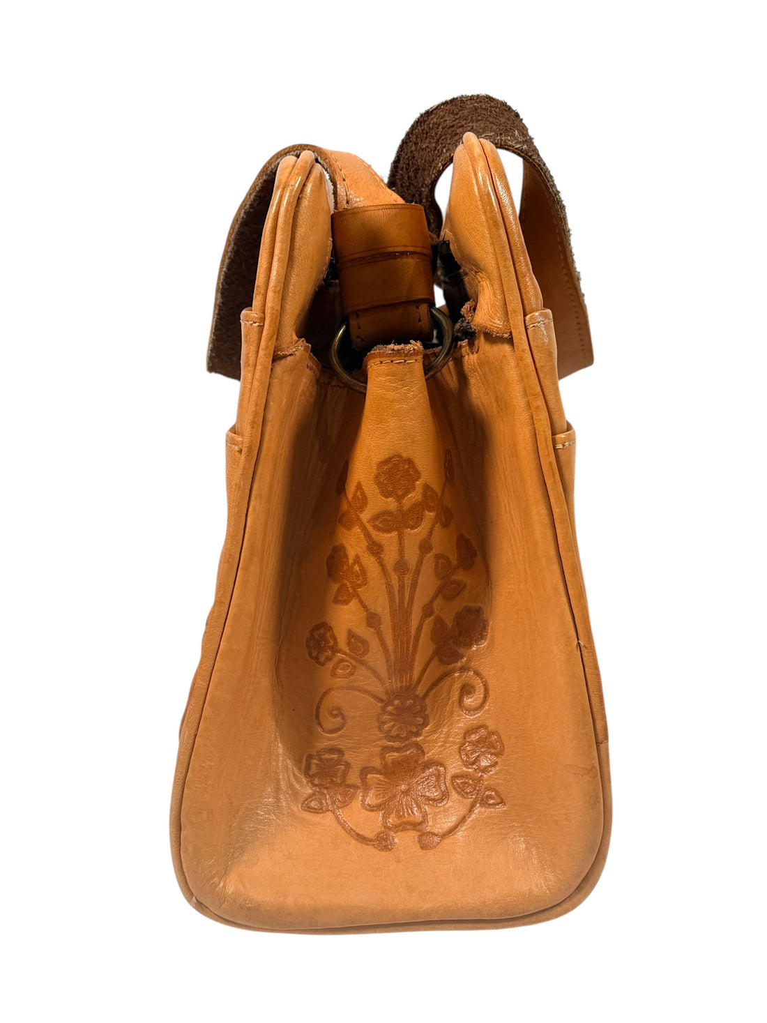 Vintage tooled leather handbag with Aztec motif. Mexican artisan carved shoulder purse, structured boho accessory with strong vintage character and collector appeal.