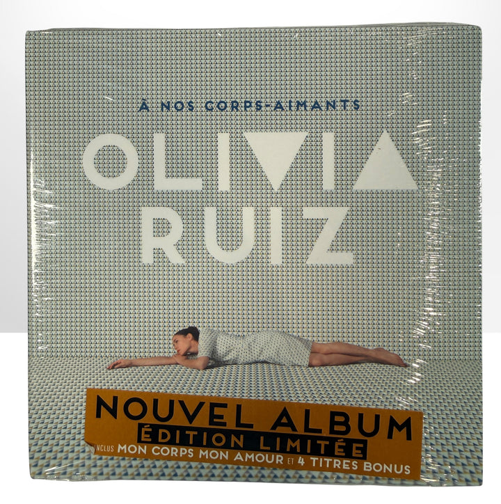 Olivia Ruiz A Nos Corps-Aimants limited edition sealed CD. 2016 French pop album with bonus tracks. Collectible Francophone music release, new condition.