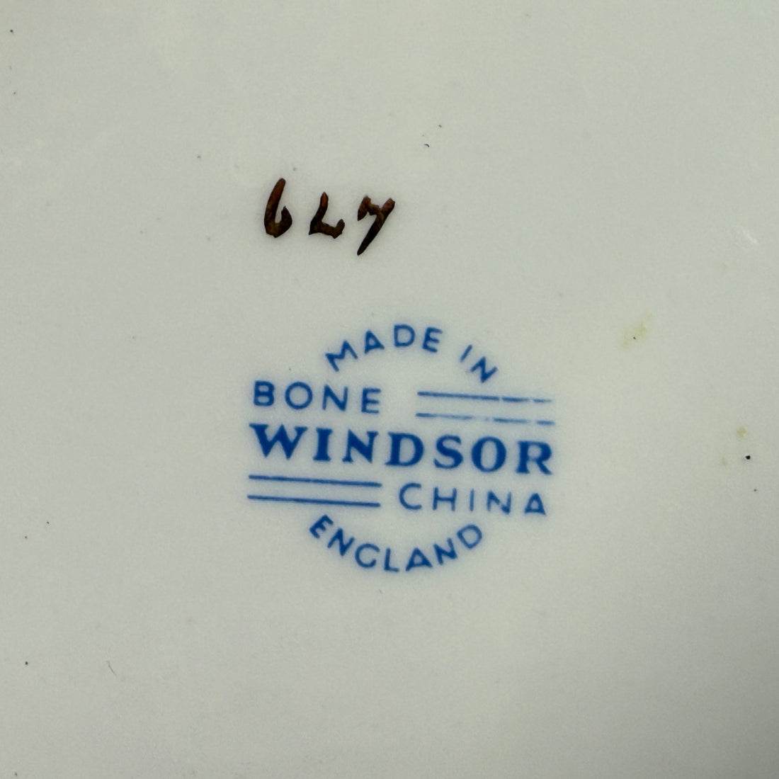 Stylized 'Made in Bone Windsor China England' mark on a white background