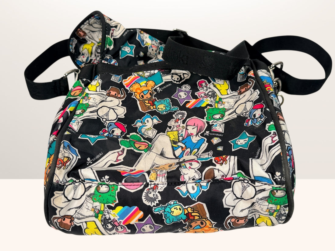 Disney Mickey Mouse collectible handbag with comic print design. Fun novelty purse for Disney fans, vintage style accessory in very good condition.