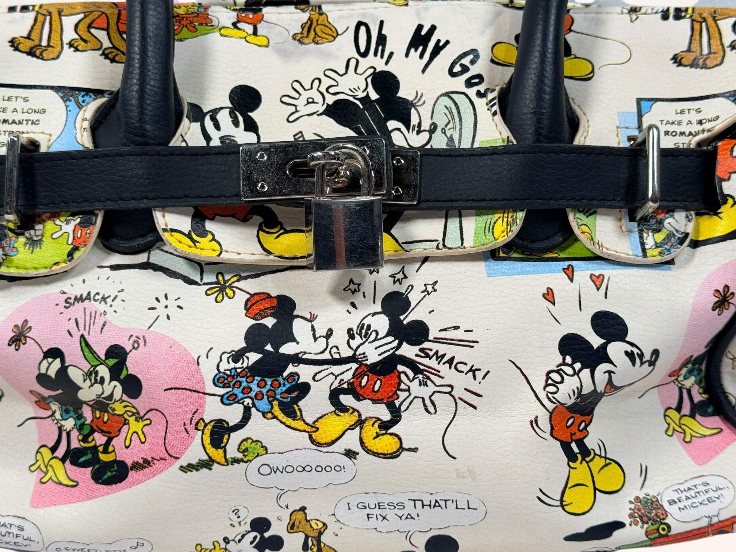 Disney Mickey Mouse collectible handbag with comic print design. Fun novelty purse for Disney fans, vintage style accessory in very good condition.