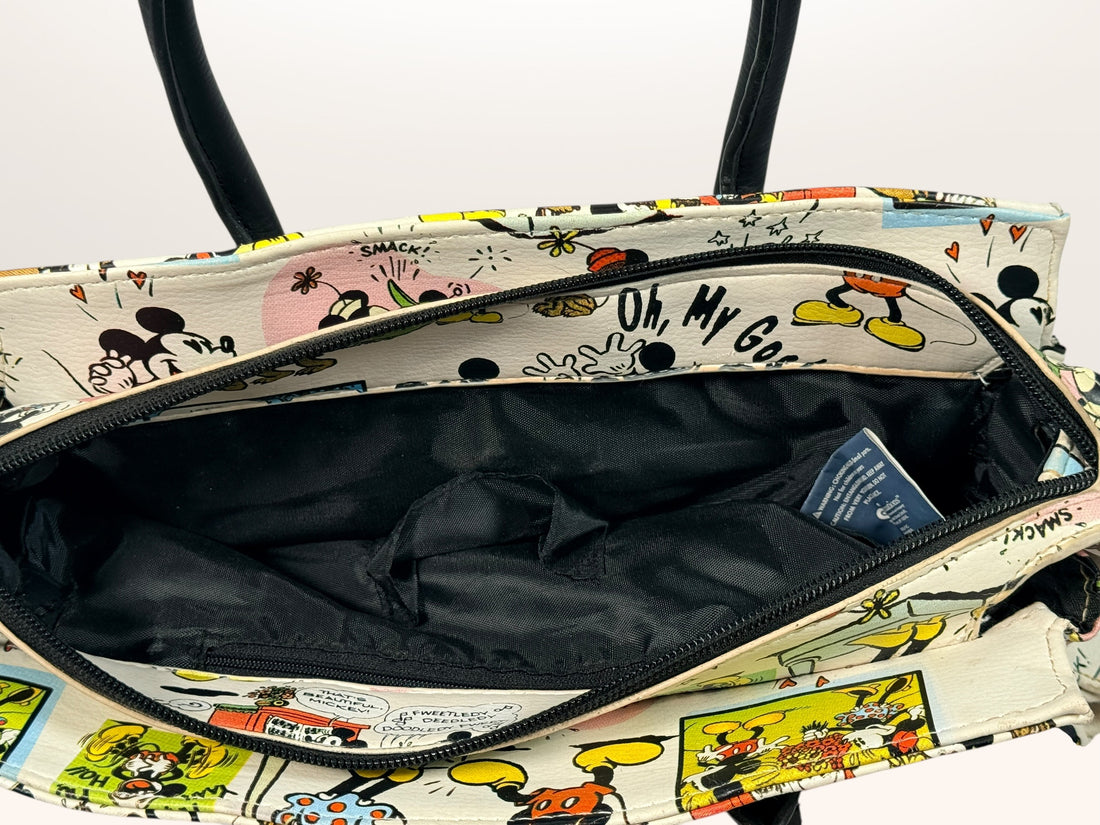 Disney Mickey Mouse collectible handbag with comic print design. Fun novelty purse for Disney fans, vintage style accessory in very good condition.