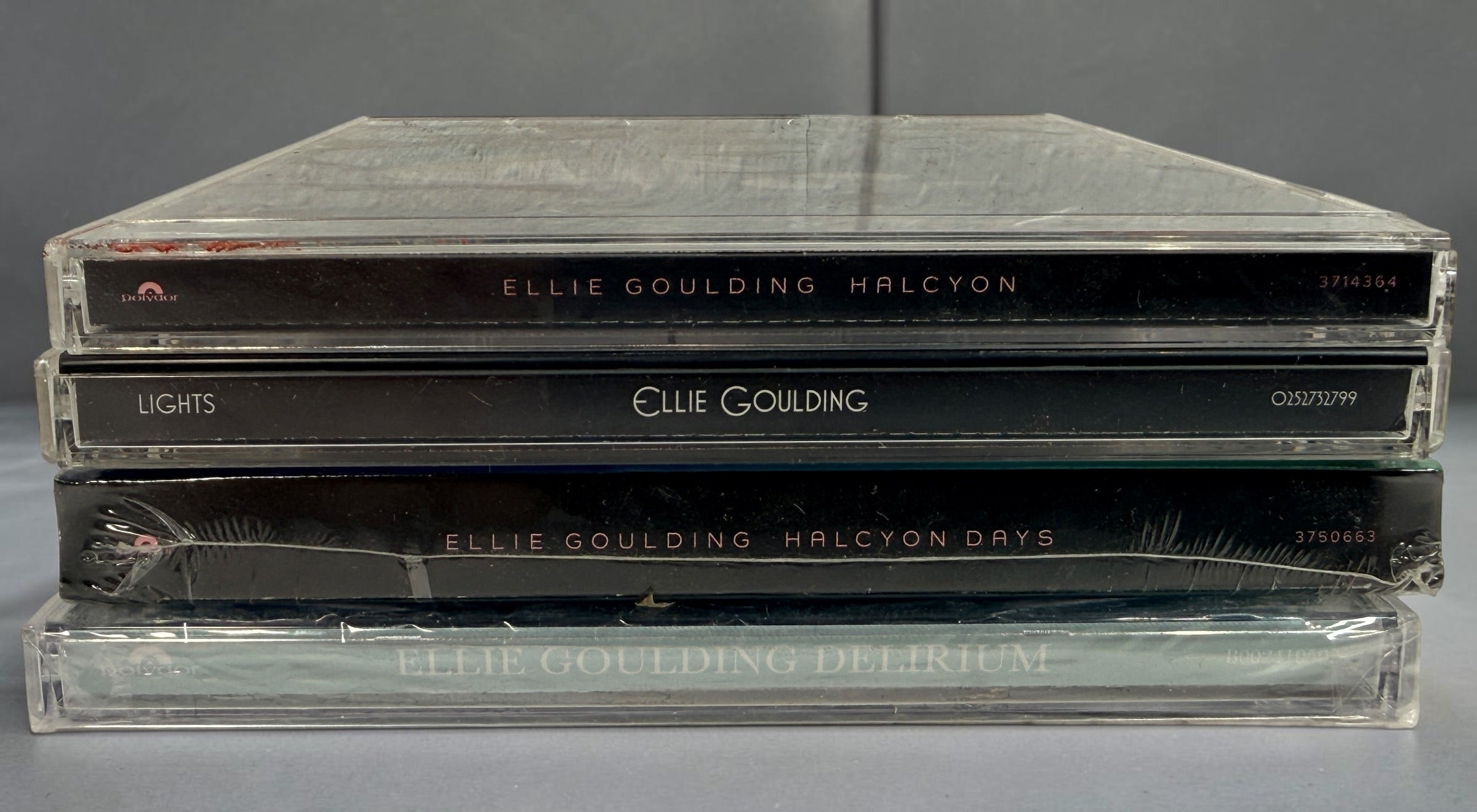 Ellie Goulding 4-album CD collection with Lights, Halcyon, sealed Halcyon Days and Delirium. Original HMV and promotional stickers included.