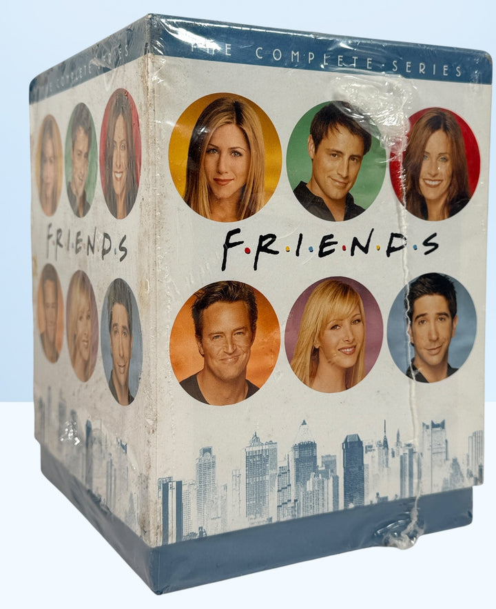 Friends Complete Series DVD box set with all 10 seasons, 40 discs. Factory sealed with shelf wear. Classic sitcom collection for collectors or binge watching.