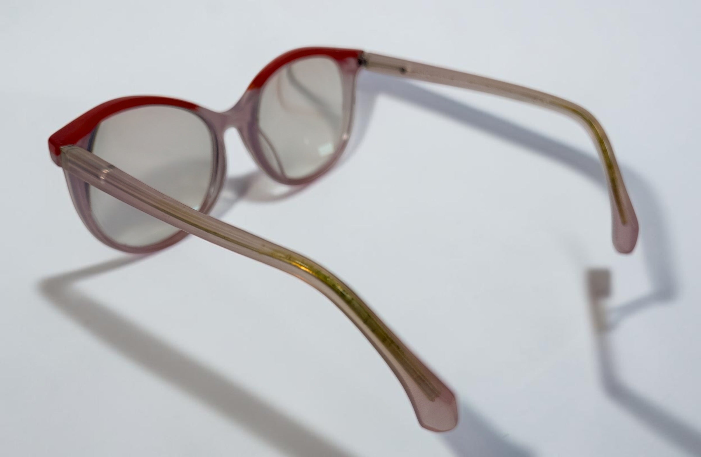 Alain Mikli A03501 004 eyeglass frame in pink and red acetate, handmade in Italy, size 54-17-140. Pre-owned with original Alain Mikli case.