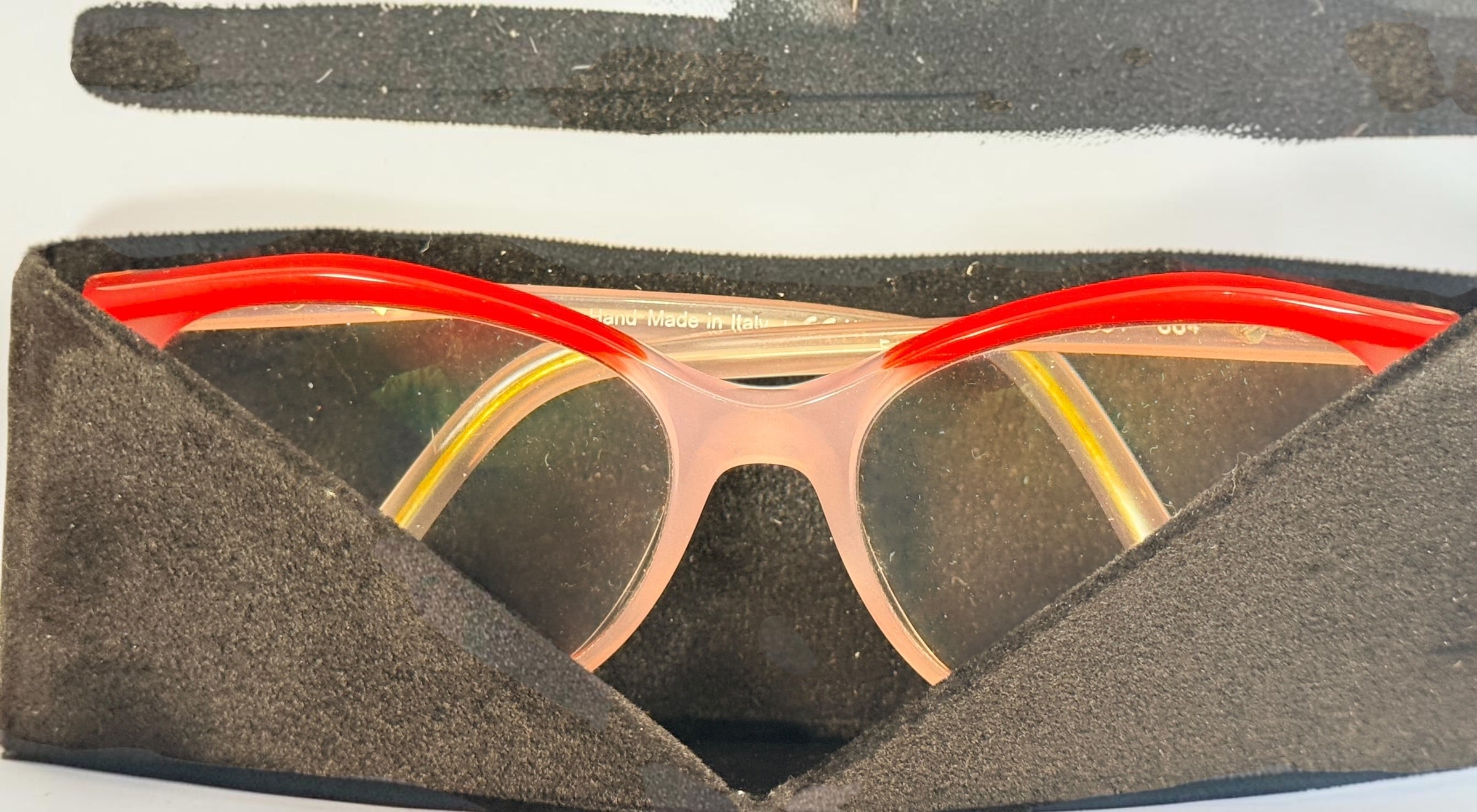 Alain Mikli A03501 004 eyeglass frame in pink and red acetate, handmade in Italy, size 54-17-140. Pre-owned with original Alain Mikli case.