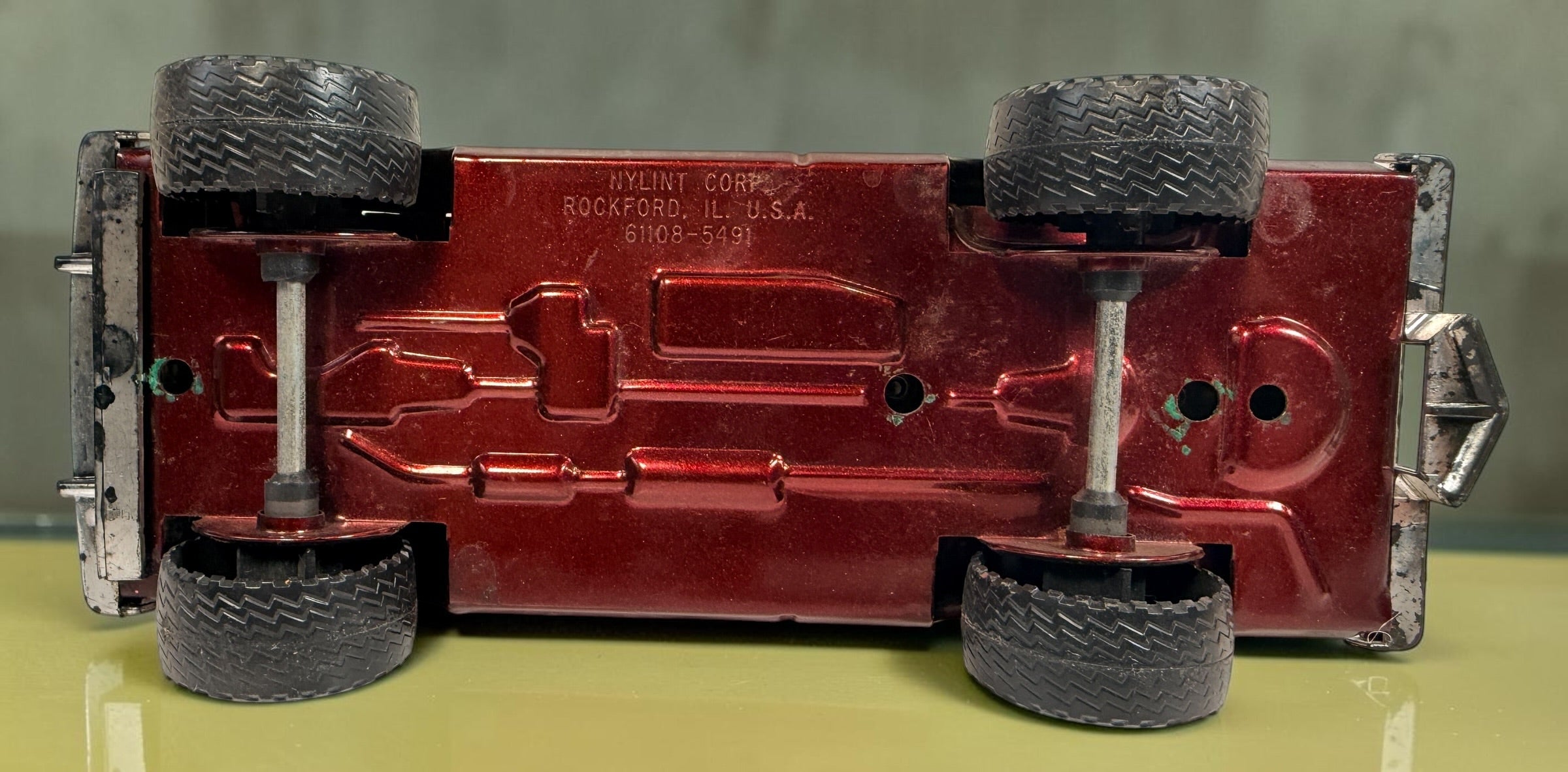 Vintage Nylint Stables Metal Muscle pressed-steel pickup truck, made in Rockford, Illinois, USA. Classic 1980s collectible toy with horse graphics.