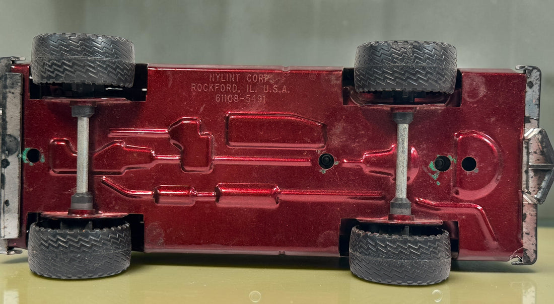 Vintage Nylint Stables Metal Muscle pressed-steel pickup truck, made in Rockford, Illinois, USA. Classic 1980s collectible toy with horse graphics.