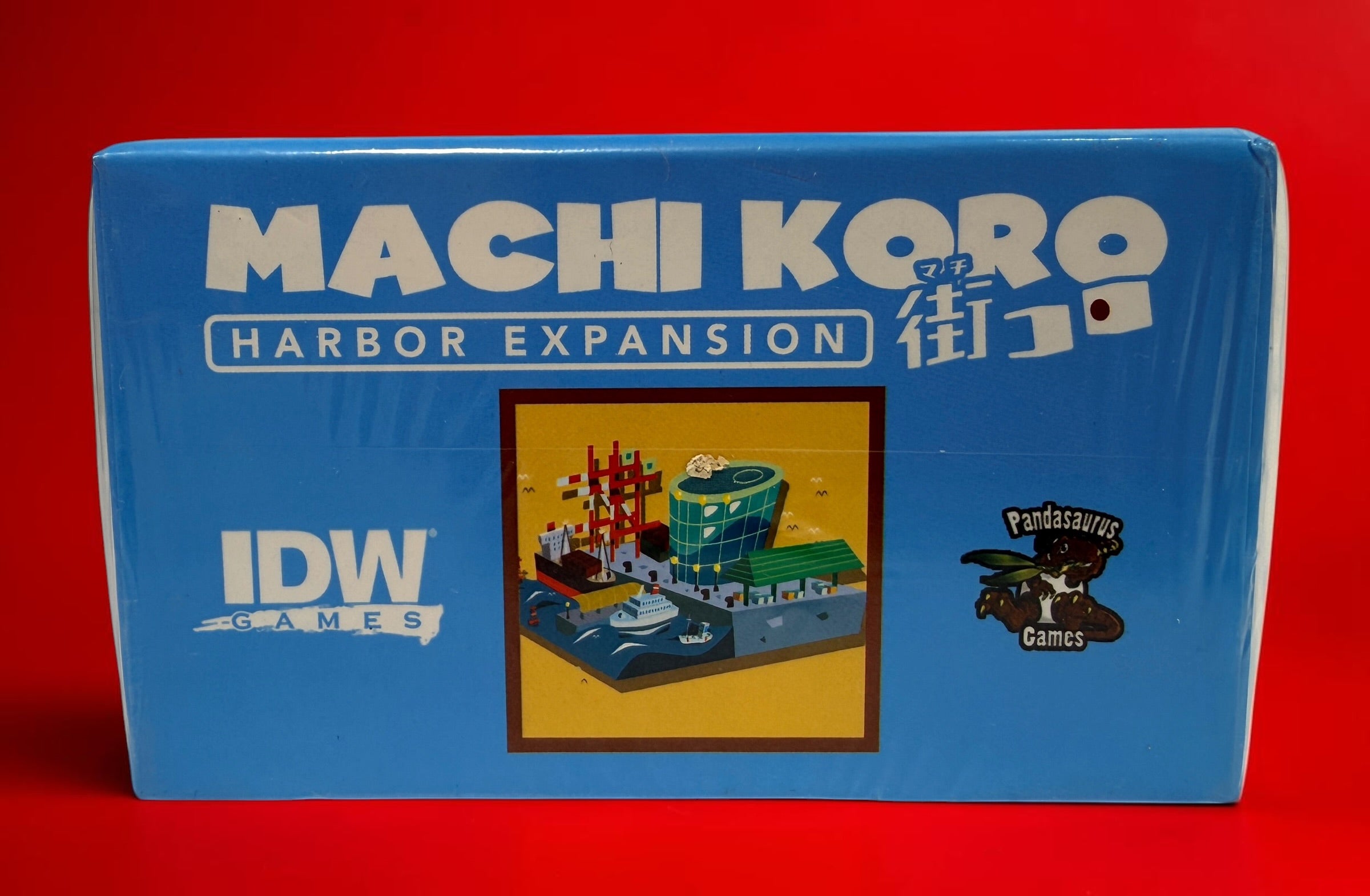 Factory-sealed Machi Koro Harbor Expansion by IDW Games. Original expansion for 2–5 players with new establishments and landmarks. Base game required.