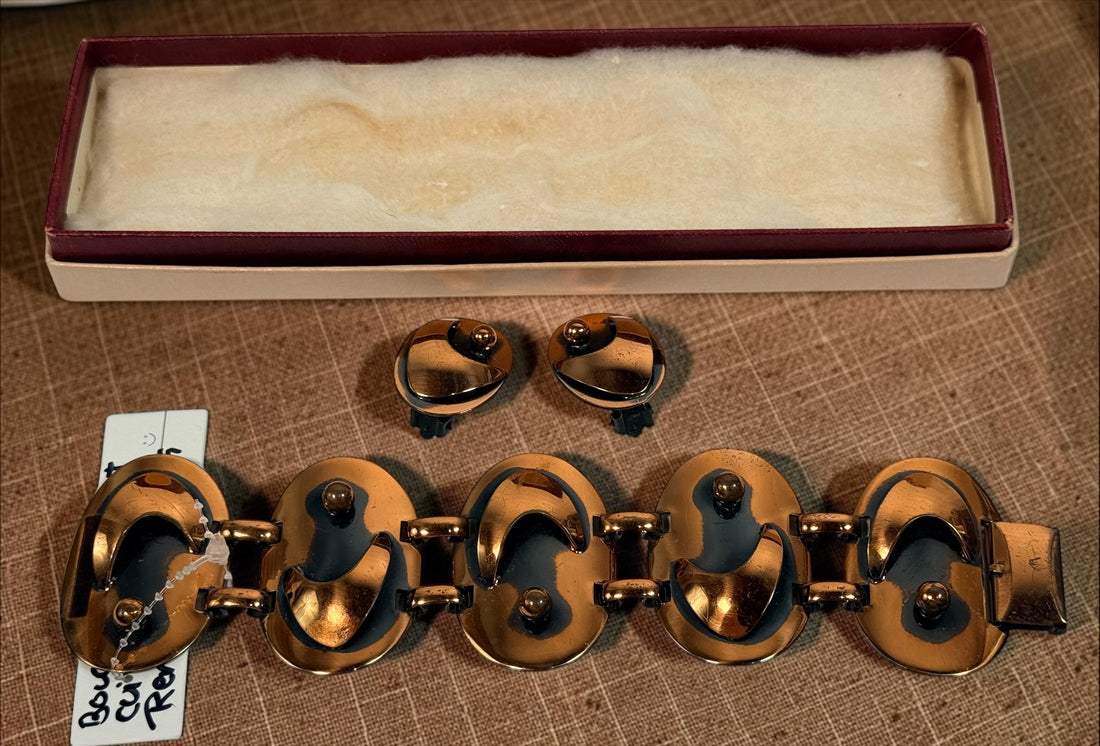Vintage genuine copper bracelet and clip-on earrings set with sculptural Mid-Century Modern design, dark accents and original-style presentation box.