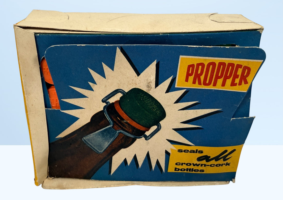 Vintage Propper swing top bottle stoppers set with original box. Retro barware bottle caps for homebrew, soda bottles, or collectible mid-century packaging.