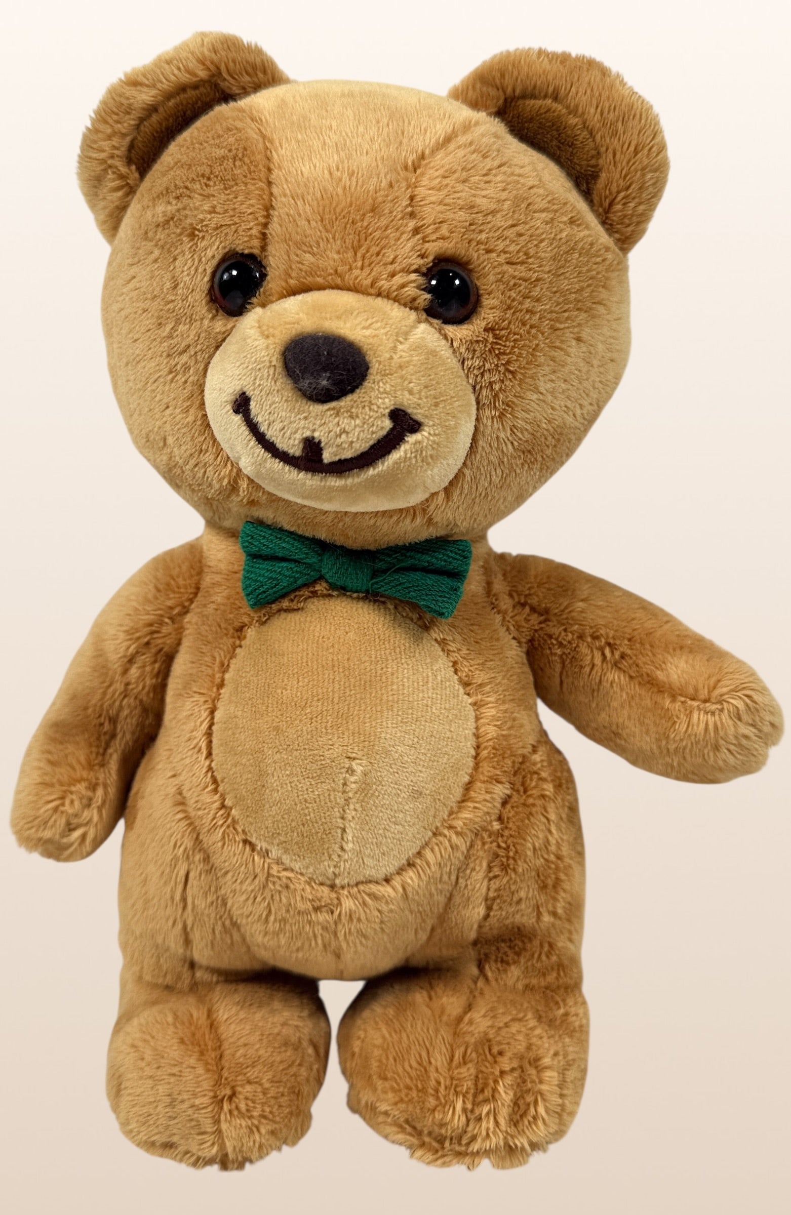 Vintage Kraft Peanut Butter GUND teddy bear plush with green bow tie. Canadian advertising collectible mascot, approx 10 inches, nostalgic branded display piece.
