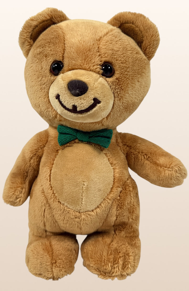 Vintage Kraft Peanut Butter GUND teddy bear plush with green bow tie. Canadian advertising collectible mascot, approx 10 inches, nostalgic branded display piece.