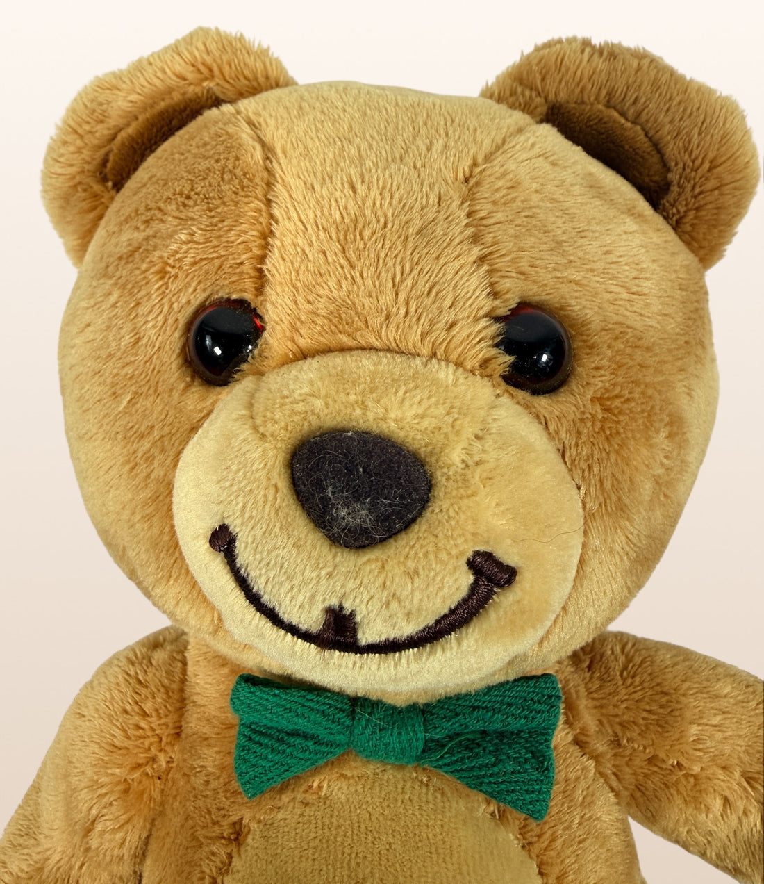 Vintage Kraft Peanut Butter GUND teddy bear plush with green bow tie. Canadian advertising collectible mascot, approx 10 inches, nostalgic branded display piece.