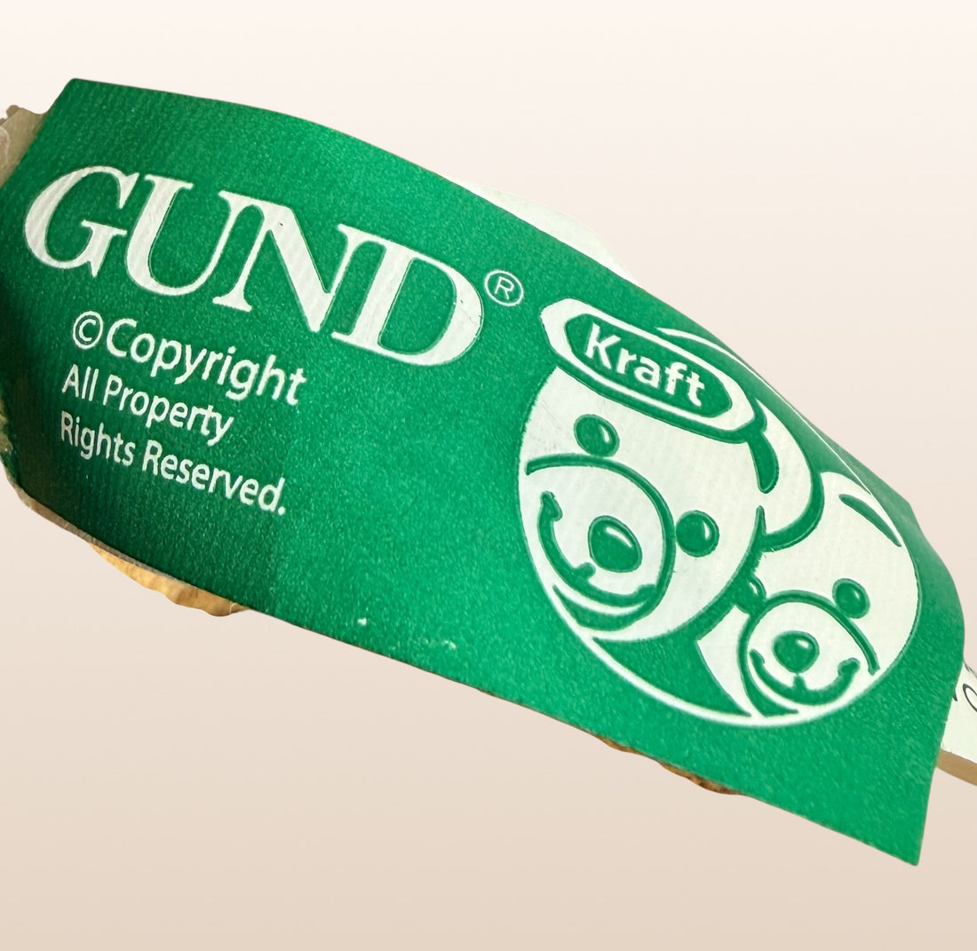 Vintage Kraft Peanut Butter GUND teddy bear plush with green bow tie. Canadian advertising collectible mascot, approx 10 inches, nostalgic branded display piece.