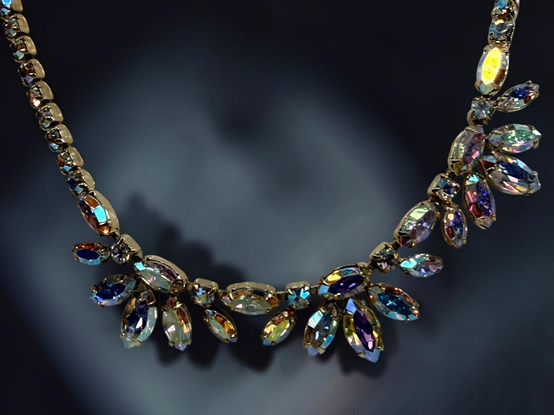 Vintage signed Sherman AB rhinestone parure with necklace, brooch and clip earrings. Mid-century Canadian costume jewelry with brilliant iridescent stones.