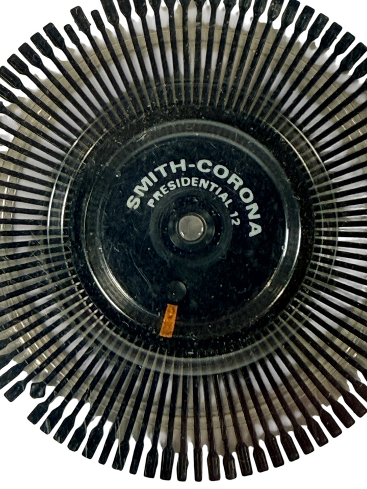 Vintage Smith Corona daisy wheel typewriter font set including Presidential 12 and Tempo 10. Original cases included. Ideal for collectors or working typewriters.