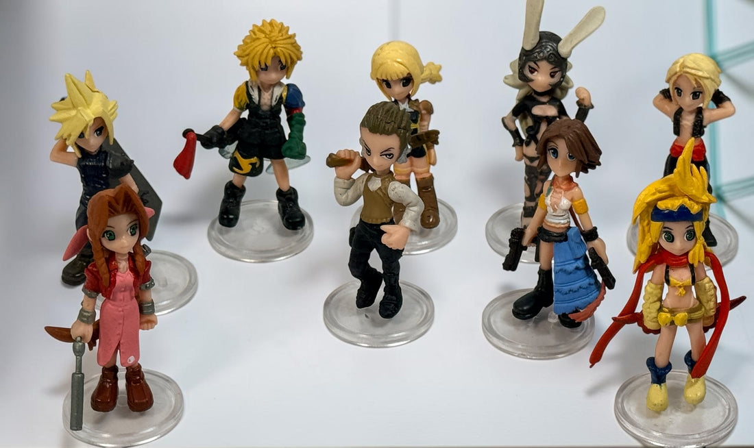 Final Fantasy lot of 10 miniature character figures with clear display stands, including Cloud and Aerith. Pre-owned collectible gaming figures.