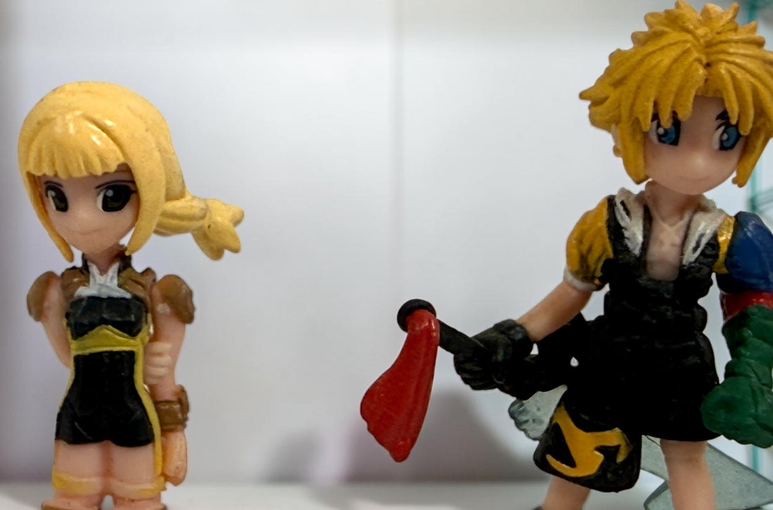 Final Fantasy lot of 10 miniature character figures with clear display stands, including Cloud and Aerith. Pre-owned collectible gaming figures.
