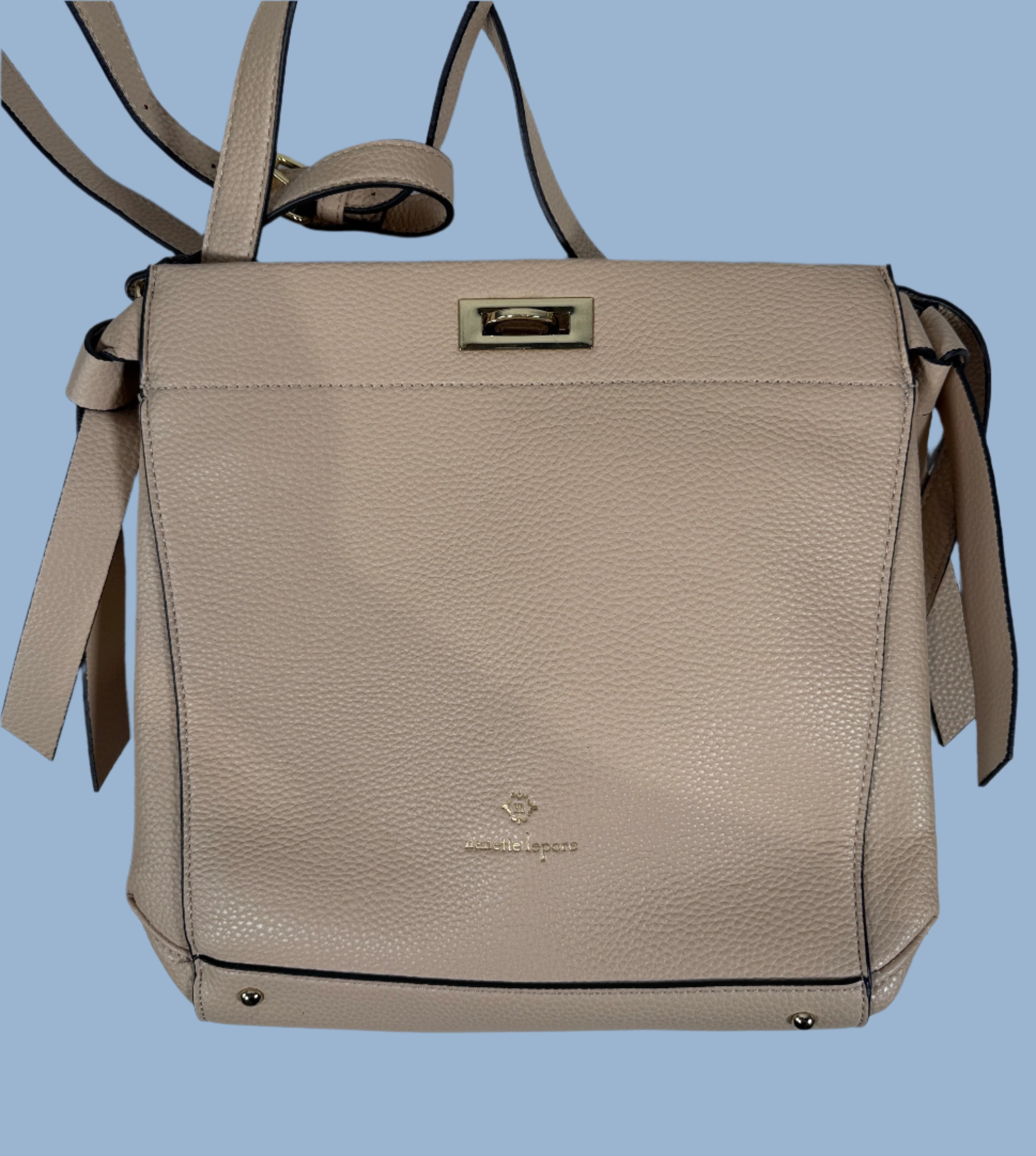 Beige handbag with a visible brand logo on a light gray background