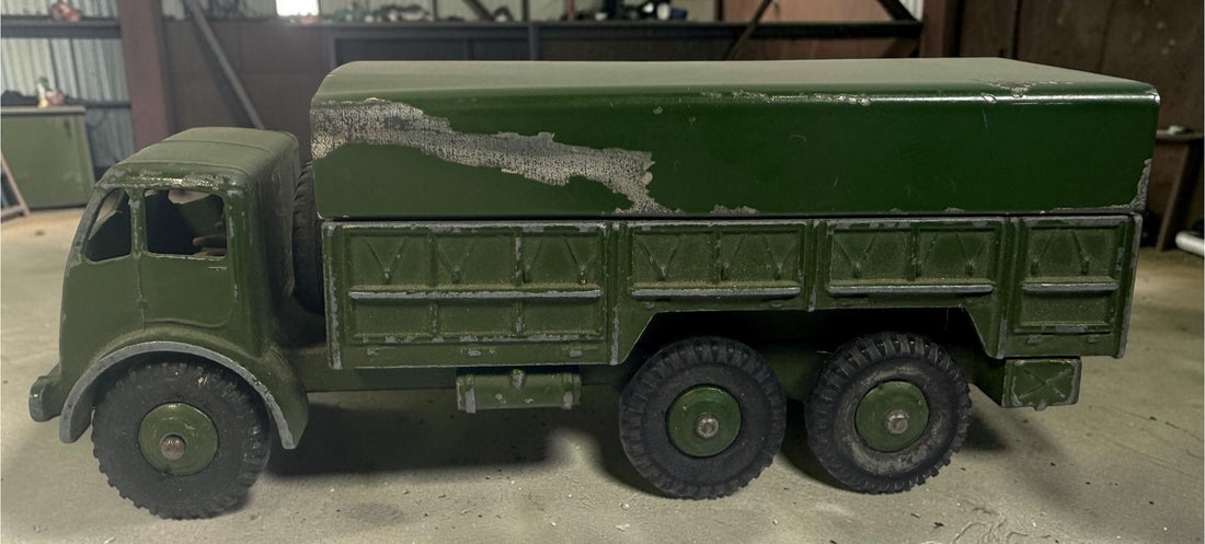 Vintage Dinky Supertoys No. 622 10-Ton Army Truck by Meccano England, with removable canopy, driver, spare wheel and authentic original wear.