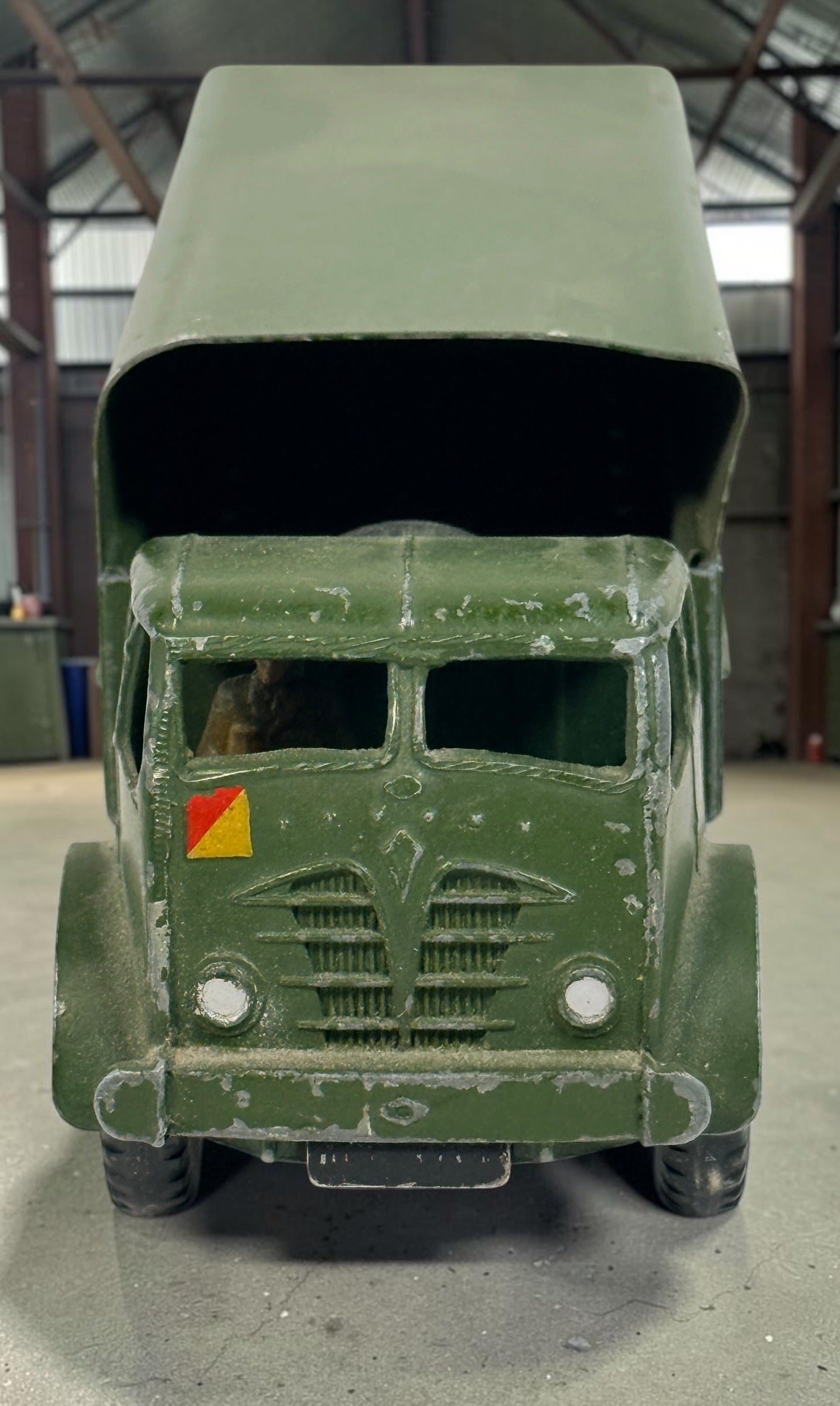 Vintage Dinky Supertoys No. 622 10-Ton Army Truck by Meccano England, with removable canopy, driver, spare wheel and authentic original wear.