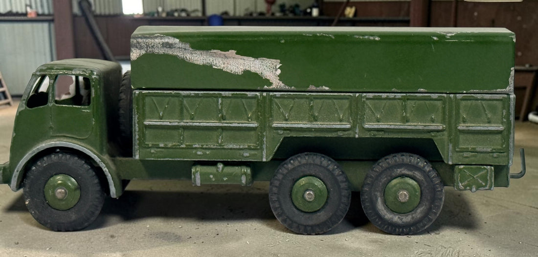 Vintage Dinky Supertoys No. 622 10-Ton Army Truck by Meccano England, with removable canopy, driver, spare wheel and authentic original wear.