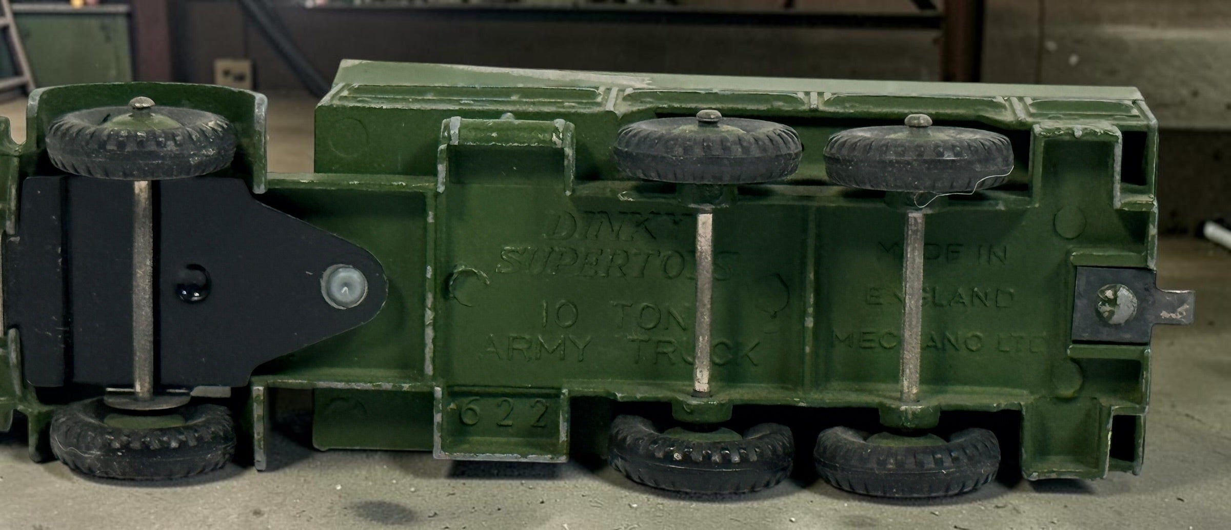 Vintage Dinky Supertoys No. 622 10-Ton Army Truck by Meccano England, with removable canopy, driver, spare wheel and authentic original wear.