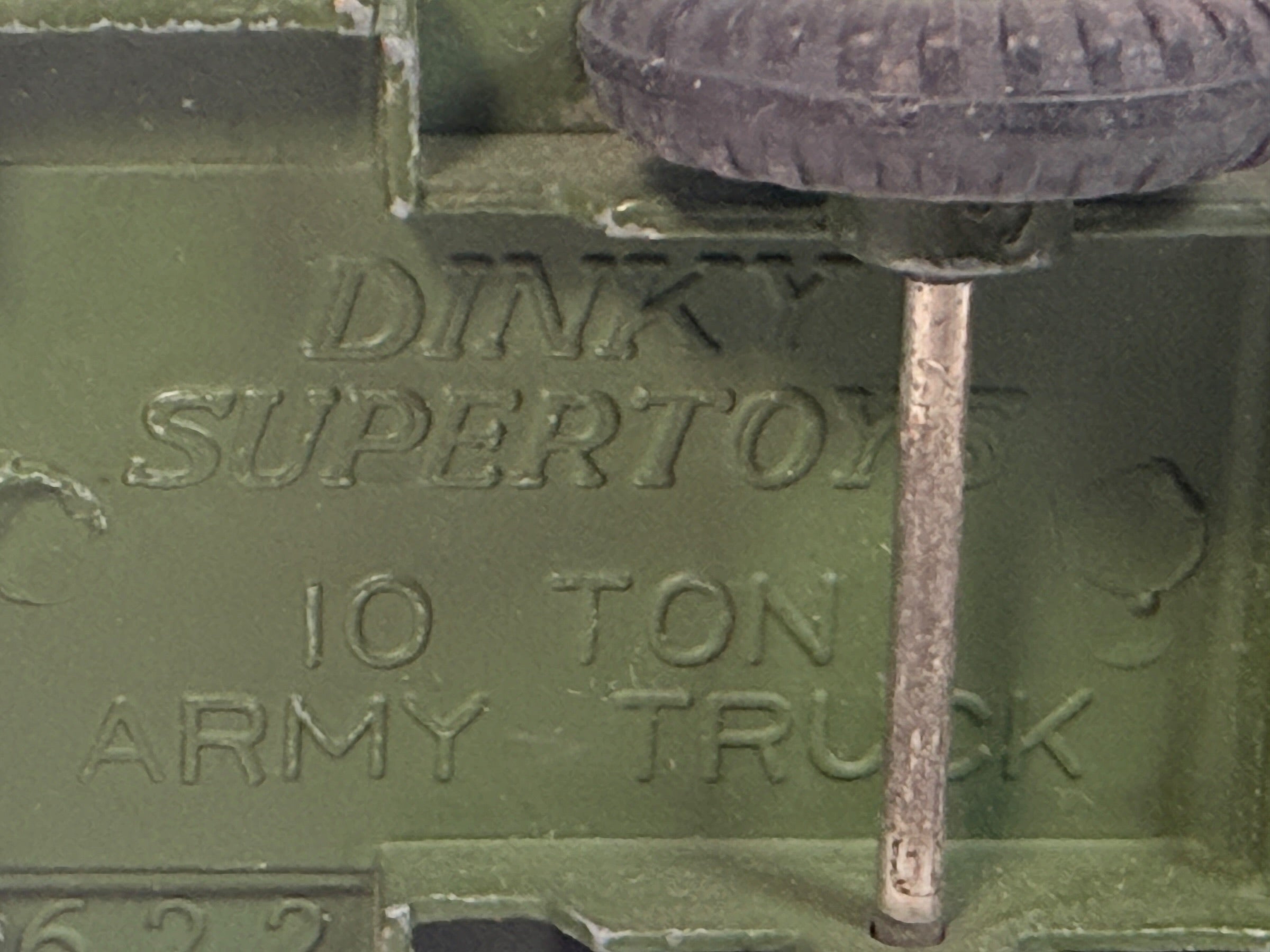 Vintage Dinky Supertoys No. 622 10-Ton Army Truck by Meccano England, with removable canopy, driver, spare wheel and authentic original wear.