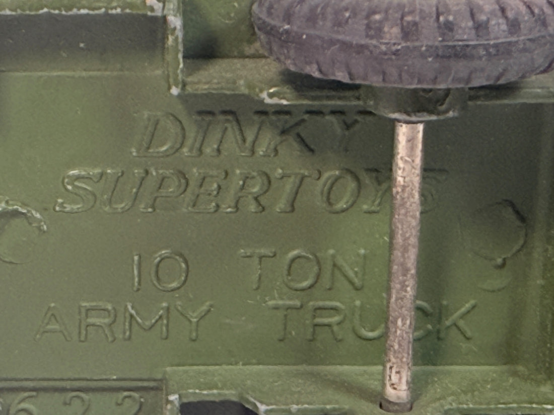 Vintage Dinky Supertoys No. 622 10-Ton Army Truck by Meccano England, with removable canopy, driver, spare wheel and authentic original wear.