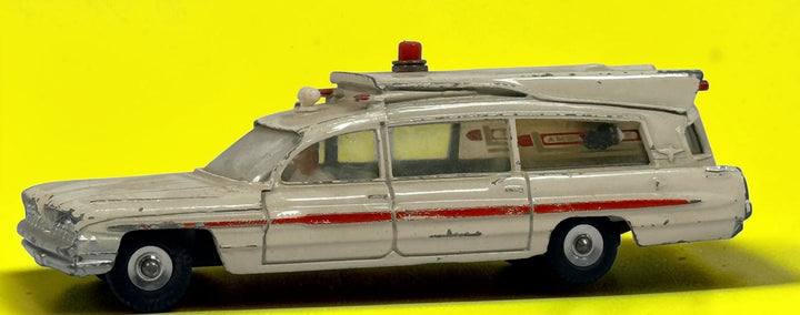 Vintage 1960s Dinky Toys No. 263 Superior Criterion Ambulance by Meccano Ltd., Made in England. Original die-cast model with authentic play wear.
