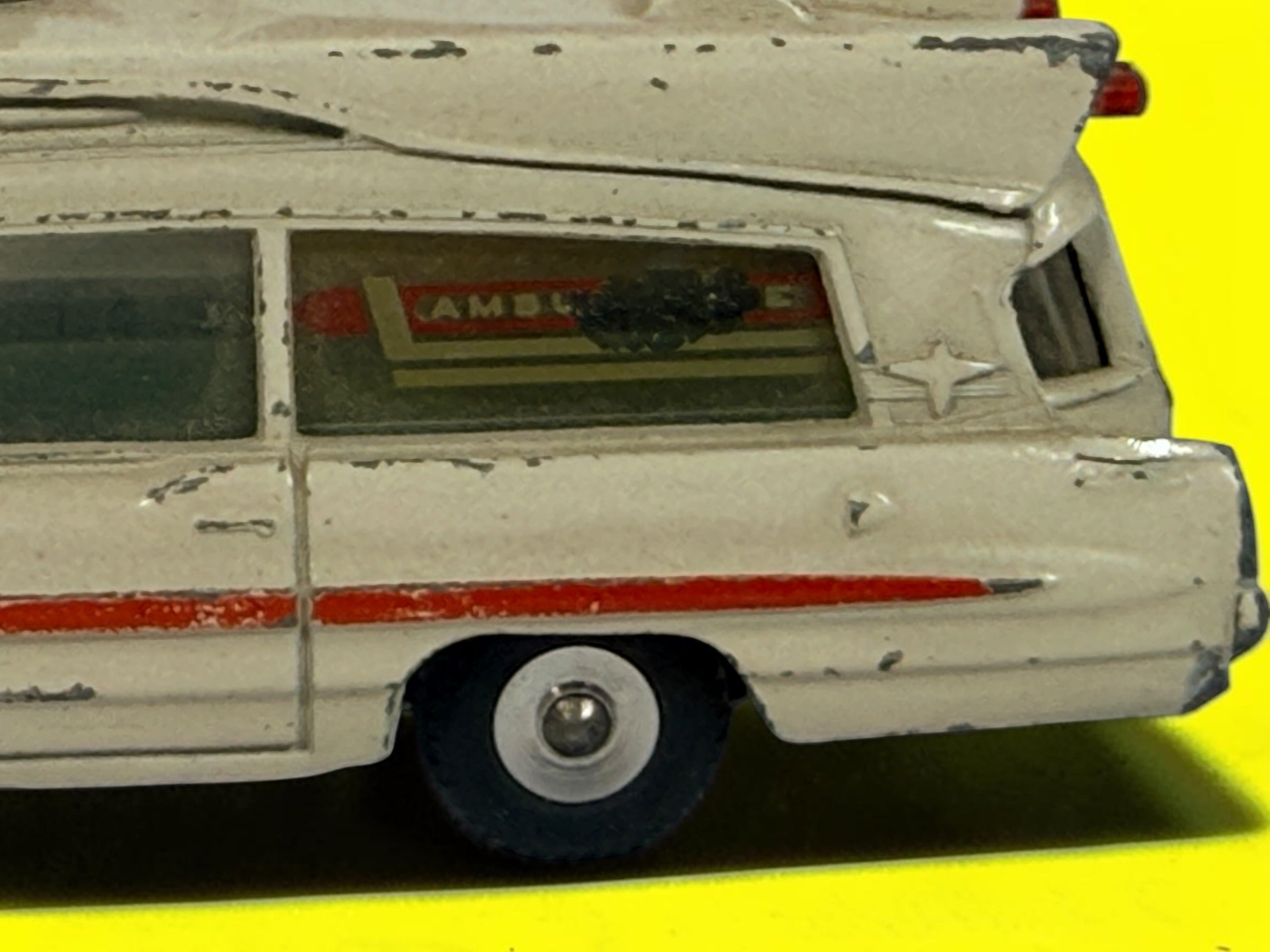 Vintage 1960s Dinky Toys No. 263 Superior Criterion Ambulance by Meccano Ltd., Made in England. Original die-cast model with authentic play wear.