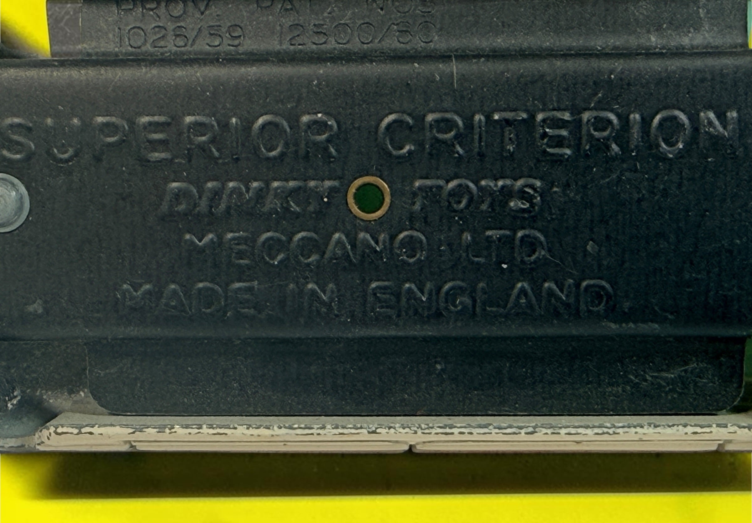 Vintage 1960s Dinky Toys No. 263 Superior Criterion Ambulance by Meccano Ltd., Made in England. Original die-cast model with authentic play wear.