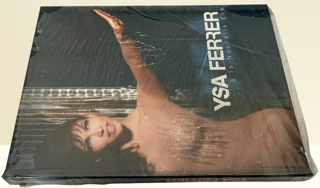 Sealed Ysa Ferrer La Nouvelle Eve concert DVD deluxe edition. French pop live performance collectible with bonus footage. Great condition with minor wrap wear.