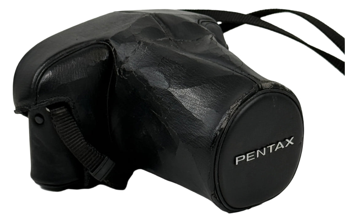 Black Pentax camera case on a light gray background