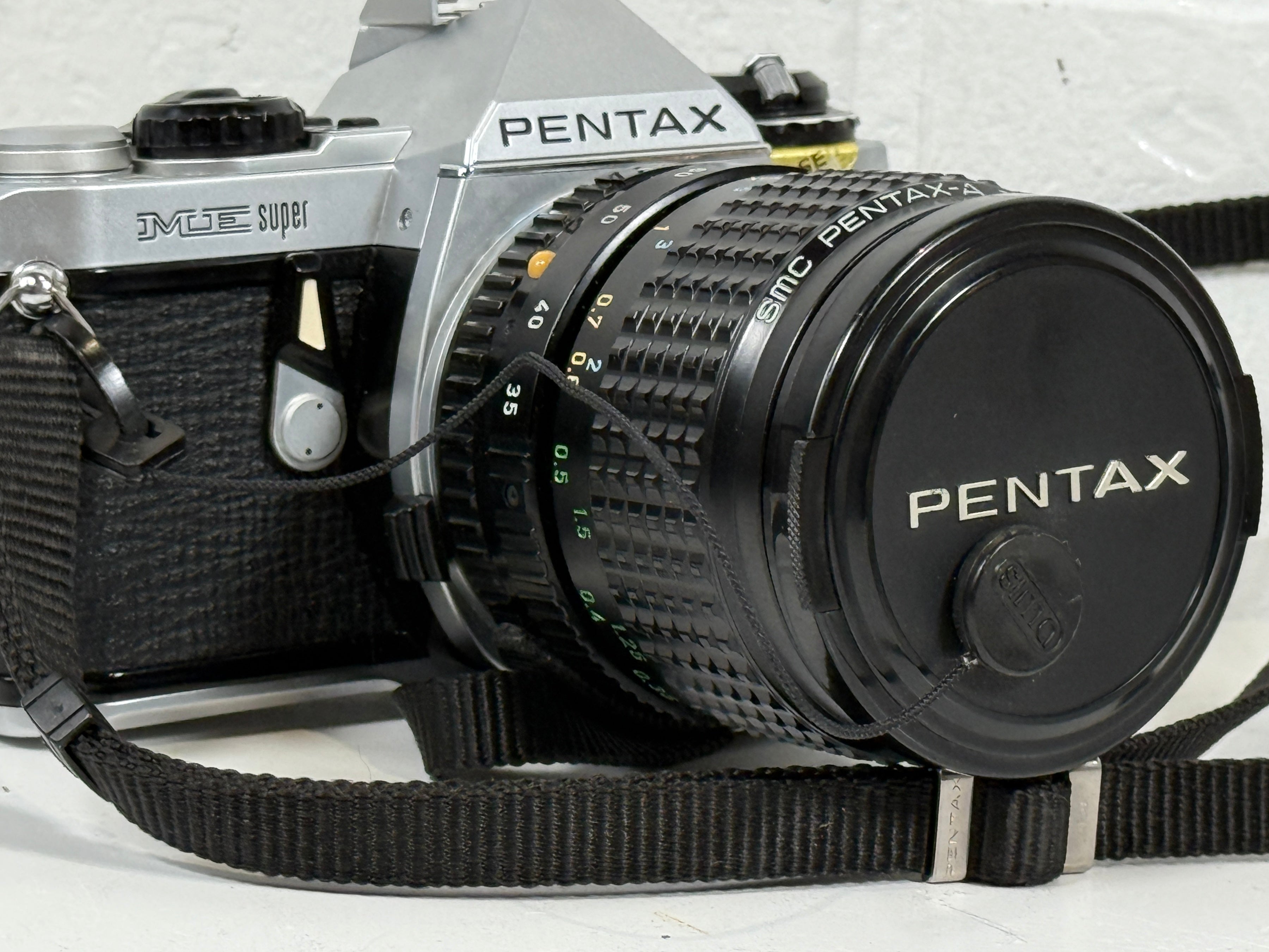 Pentax ME Super 35mm SLR Film Camera + SMC Pentax-A Zoom 28–80mm Lens – Untested – w/ Leather Case