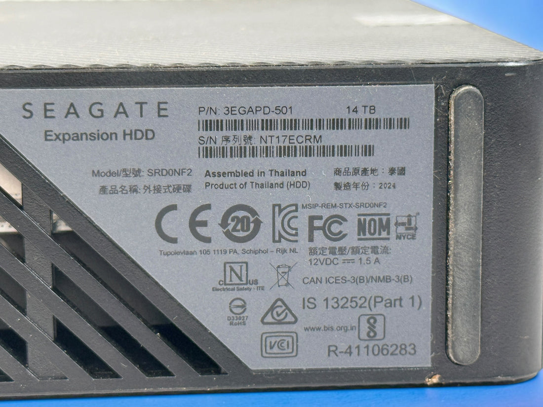 Tested Seagate Expansion 14TB external HDD, model SRD0NF2. 2024 high-capacity desktop storage drive. HDD only; cables and power adapter not included.