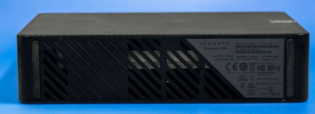 Tested Seagate Expansion 14TB external HDD, model SRD0NF2. 2024 high-capacity desktop storage drive. HDD only; cables and power adapter not included.