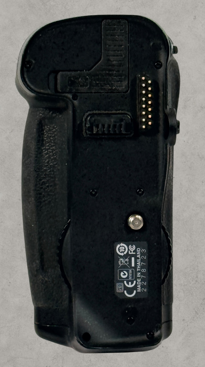 Nikon MB-D10 battery grip for D300 and D700 DSLR cameras. Genuine vertical grip sold AS-IS. Great replacement or parts unit for Nikon photographers.