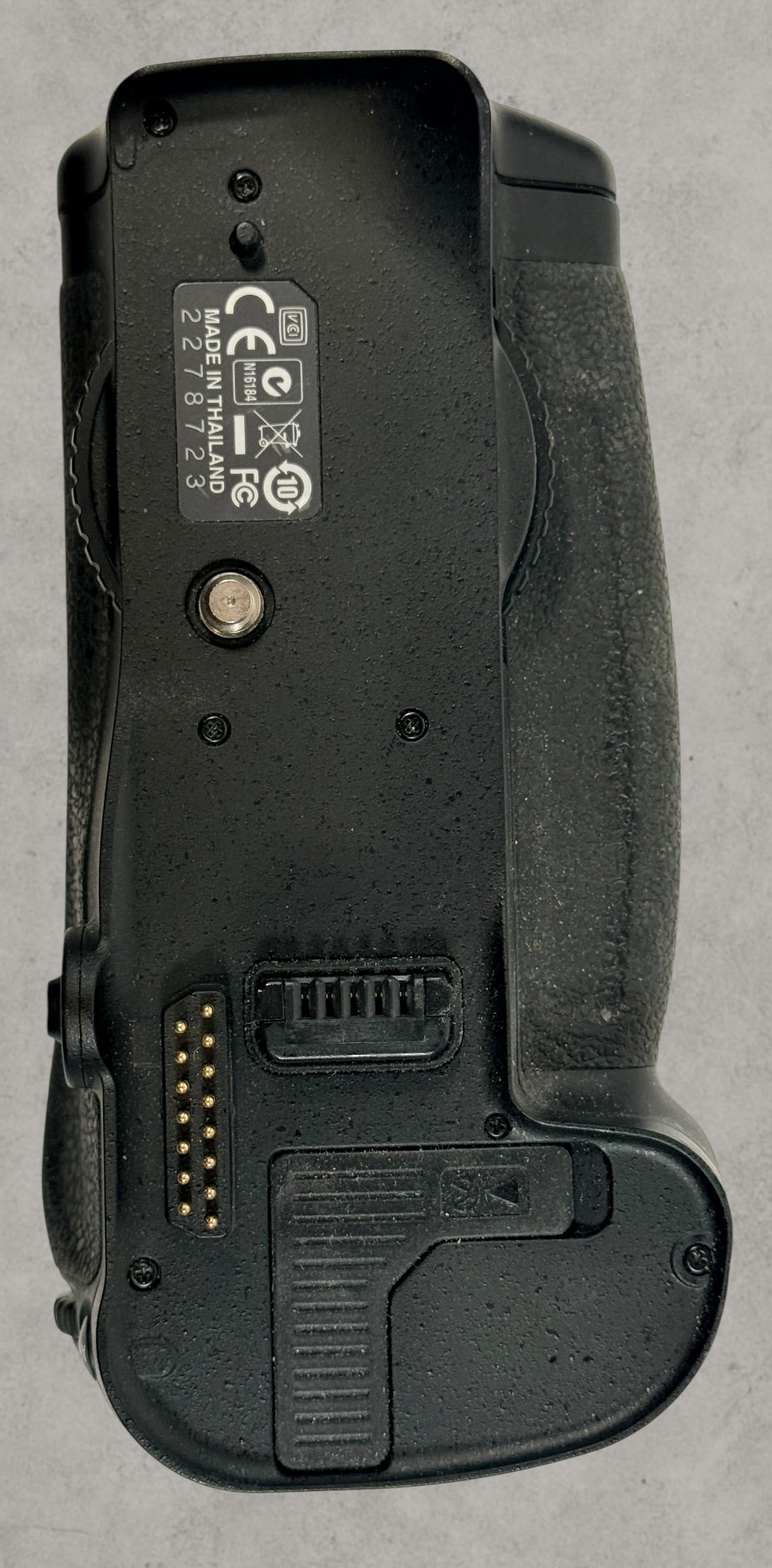 Nikon MB-D10 battery grip for D300 and D700 DSLR cameras. Genuine vertical grip sold AS-IS. Great replacement or parts unit for Nikon photographers.