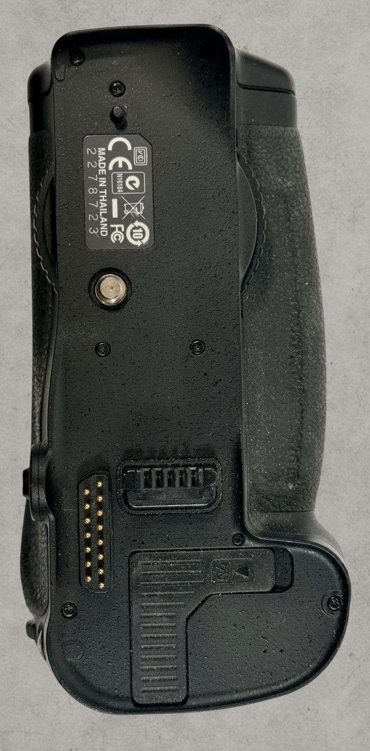 Nikon MB-D10 battery grip for D300 and D700 DSLR cameras. Genuine vertical grip sold AS-IS. Great replacement or parts unit for Nikon photographers.