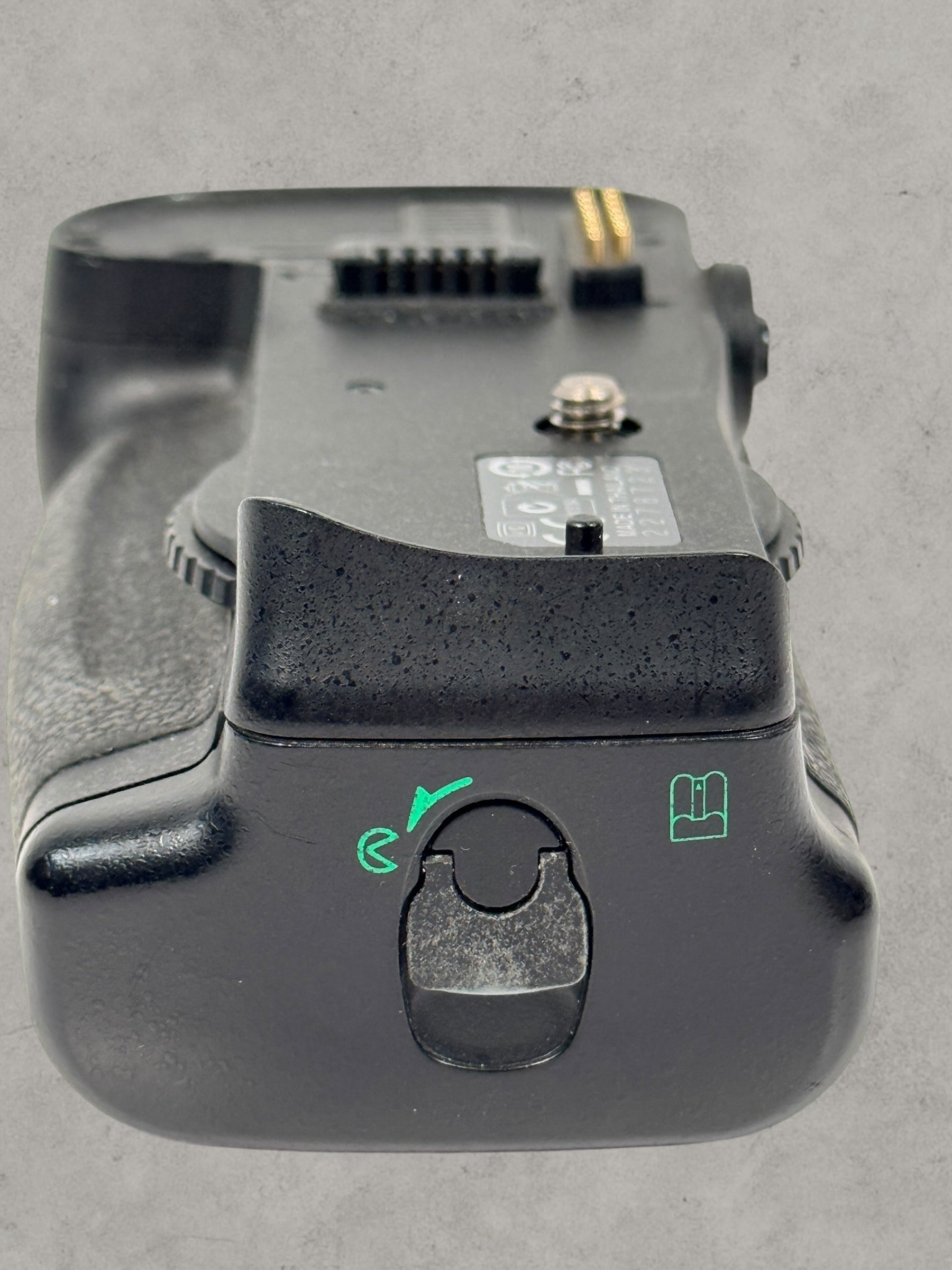 Nikon MB-D10 battery grip for D300 and D700 DSLR cameras. Genuine vertical grip sold AS-IS. Great replacement or parts unit for Nikon photographers.