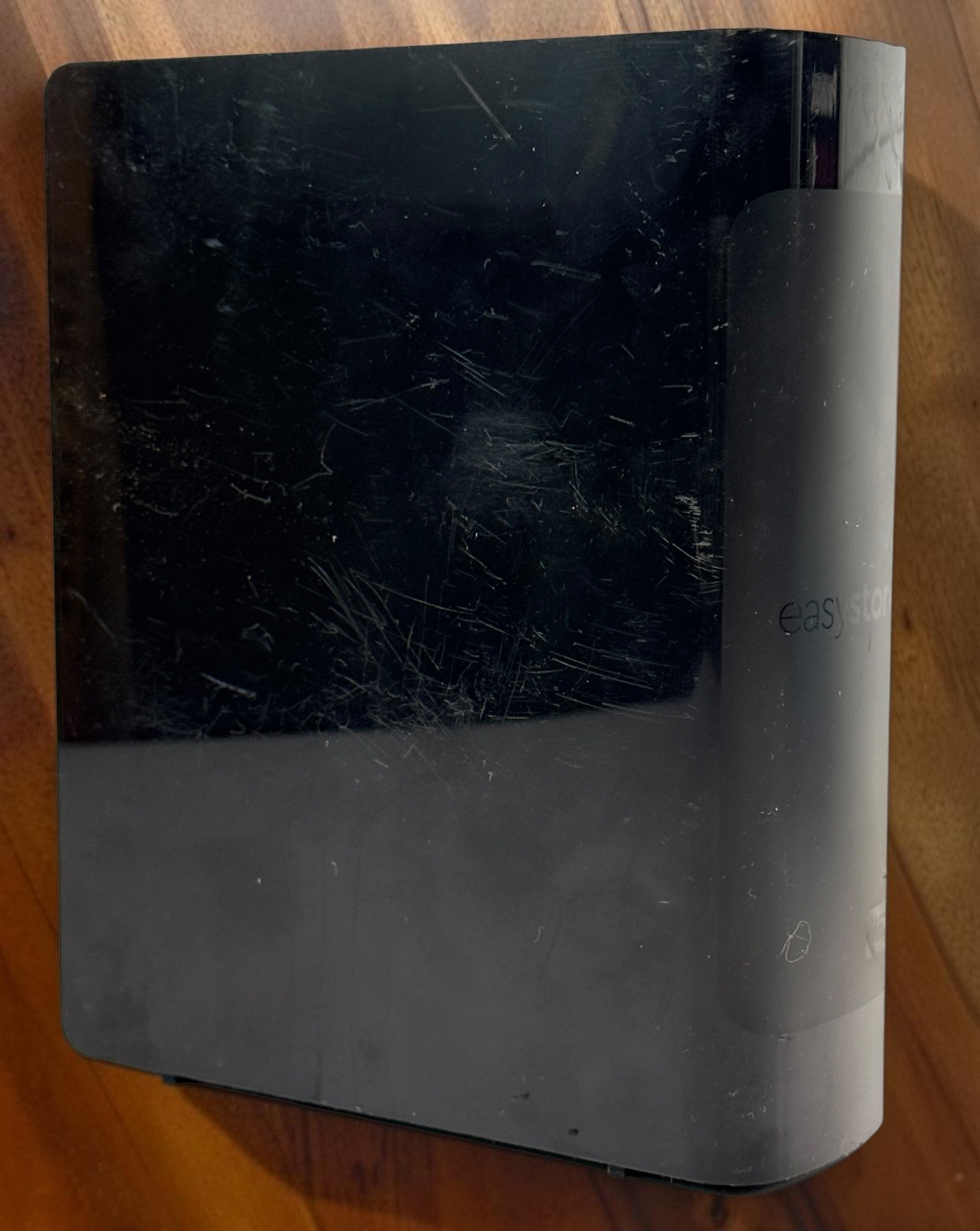 WD Easystore 14TB external hard drive, tested and working. USB desktop storage unit. Power adapter and USB cable not included. Used condition.