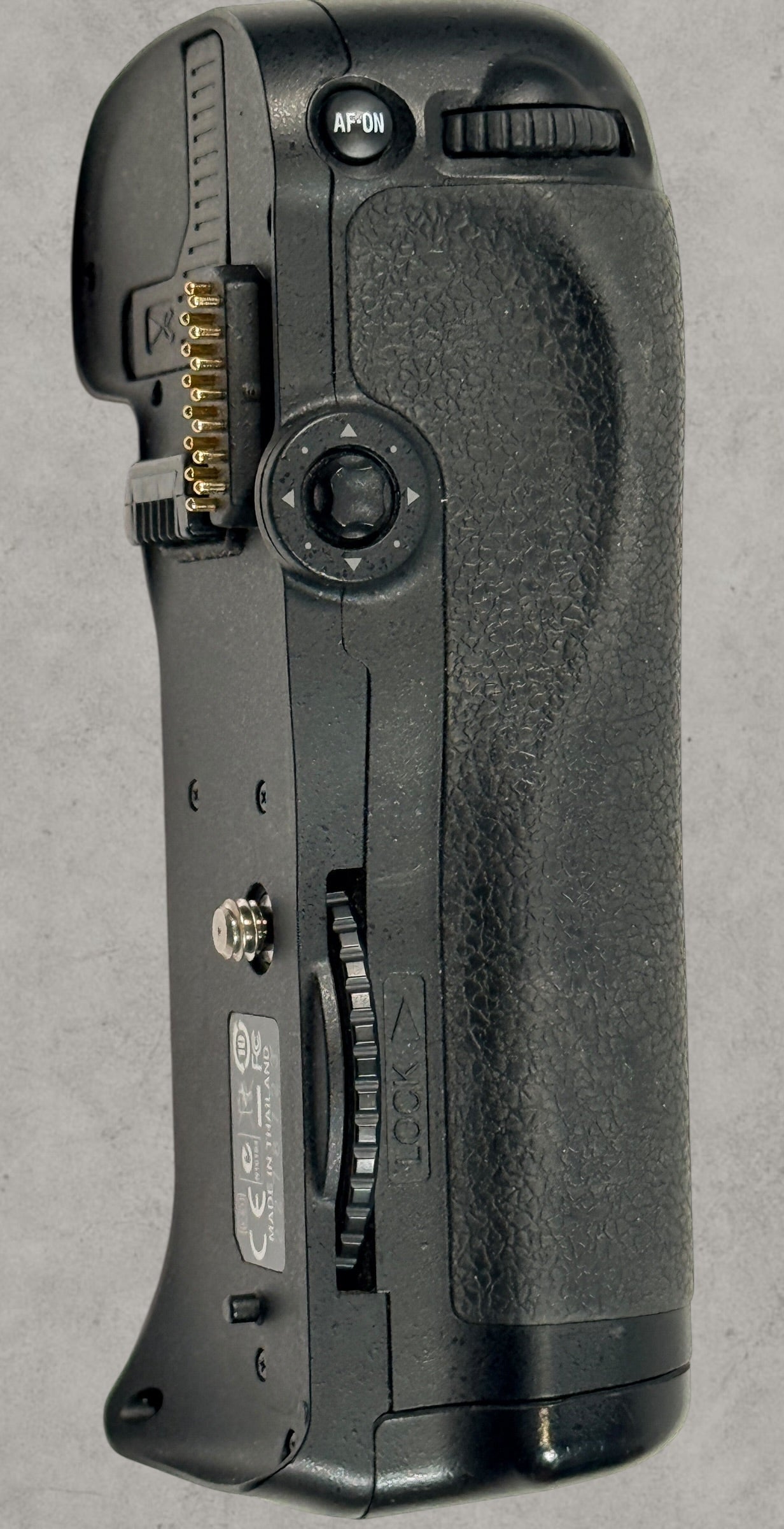 Nikon MB-D10 battery grip for D300 and D700 DSLR cameras. Genuine vertical grip sold AS-IS. Great replacement or parts unit for Nikon photographers.