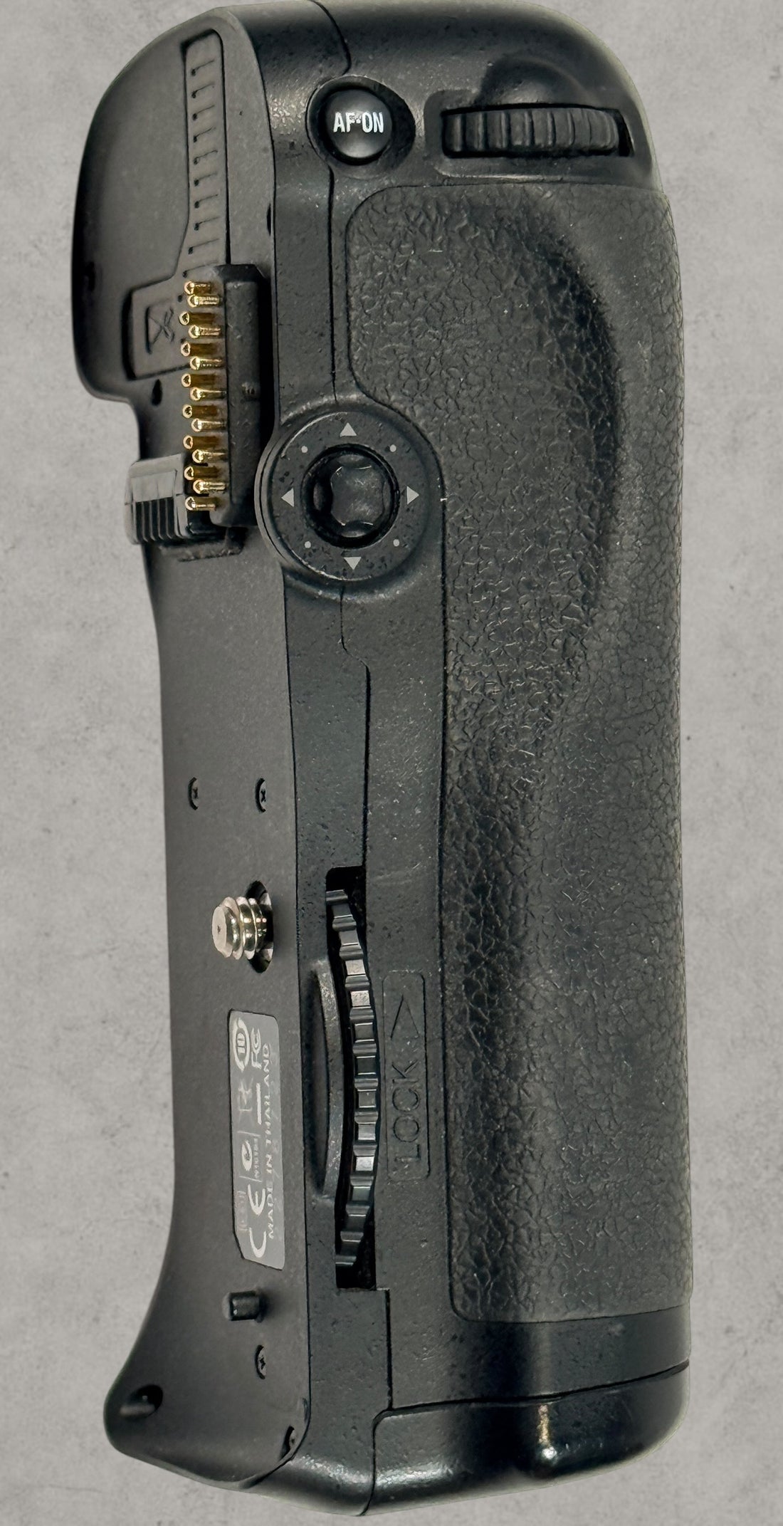 Nikon MB-D10 battery grip for D300 and D700 DSLR cameras. Genuine vertical grip sold AS-IS. Great replacement or parts unit for Nikon photographers.