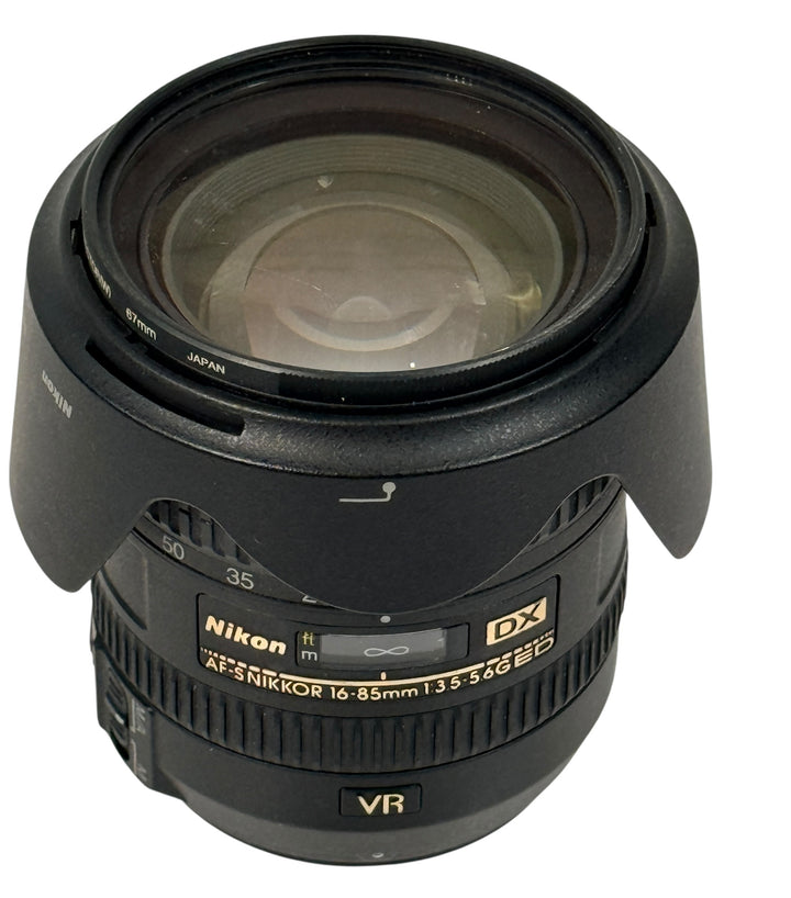 Nikon AF-S DX 16-85mm VR zoom lens for Nikon DSLR cameras. Stabilized versatile lens with strong resale demand, sharp optics, and reliable autofocus performance.