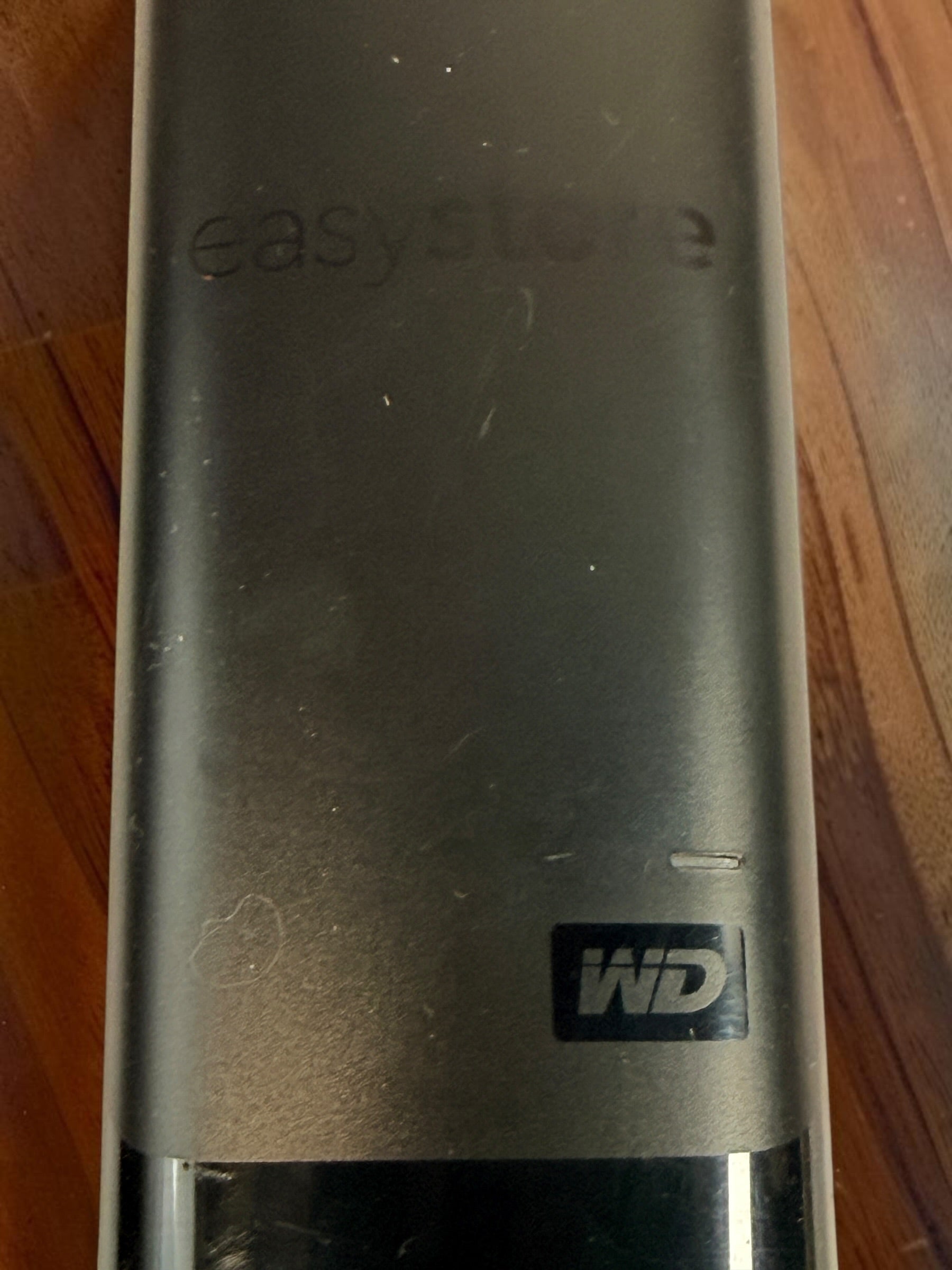 WD Easystore 14TB external hard drive, tested and working. USB desktop storage unit. Power adapter and USB cable not included. Used condition.